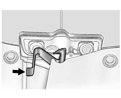 Chevrolet Equinox: Vehicle Checks. 2. Move the secondary hood release lever to the right to release the striker.