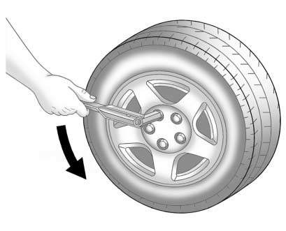 Chevrolet Equinox: Wheels and Tires. 3. Turn the wheel wrench counterclockwise to loosen all the wheel nuts, but do