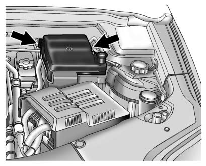 Chevrolet Equinox: Electrical System Chevrolet Equinox: Electrical System. To remove the fuse block cover, squeeze the clips on the cover and lift it straight